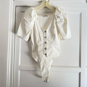 Nocturne Elegant White Button-Up Women's Bodysuit